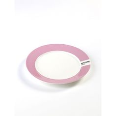 a pink and white plate on a white surface