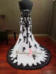 a black and white wedding dress on display