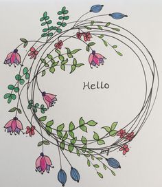 a card with the words hello written on it and colorful flowers in a circle surrounded by leaves