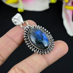 Blue Fire Labradorite Pendant, Gemstone Silver Pendant, 925 Sterling Silver Jewelry, Genuine Handmade Pendant For Necklace, Gift For Her SKU - KG-537 Handmade Pendant Gemstone - Labradorite Stone Shape - Oval Metal Purity - 925 Sterling Silver Benefits Of Wearing Silver As a metal, silver has significant health benefits that have been used across cultures for centuries. Silver has a proven track record as a powerful antimicrobial agent fighting infections and aiding in cold and flu prevention, w Labradorite Gemstone For Jewelry Making, Labradorite Gemstone Oval Pendant Jewelry, Oval Labradorite Gemstone Pendant Jewelry, Labradorite Gemstone Round Pendant, Oval Labradorite Gemstone Pendant, Silver Labradorite Gemstone Jewelry, Labradorite Gemstone Pendant Jewelry, Handmade Sapphire Jewelry With Oval Pendant, Oval Labradorite Jewelry Stamped 925