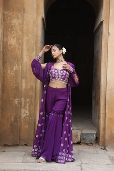 Featuring Peach yellow tie-dye silk blouse with thread, cutdana, sequence, mirror, zari, beads embroidered paired with silk detailed lehenga with choker dupatta. Fabric - Silk, Georgette Components - 3 Colour - Purple Embroidery details - Hand Embroidery Delivery time - 2-3 weeks Washing Instructions - Dry-clean Choker Dupatta, Purple Cape, Purple Embroidery, Yellow Tie, Yellow Ties, Colour Purple, Silk Dyeing, Fabric Silk, Embroidery Details