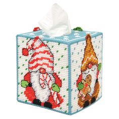 a cross stitch tissue box with santa and snowman on it