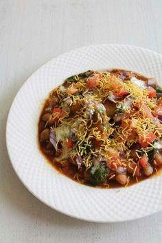 a white plate topped with lots of food