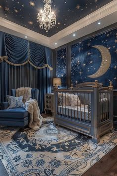 a baby's room decorated in blue with stars and moon designs on the ceiling