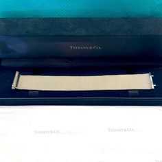 Tiffany & Co. Diamond And Mesh Bracelet, Size Small This Is A Gorgeous Piece By Tiffany. Since Discontinued It Is A Sterling Silver Mesh Bracelet. Size Small: 6” Long By 0.75” Wide. I Have Worn This Several Times But Have Purchased Other Pieces And Never Wear It Anymore. Matching Ring Also For Sale Note: In Order To Put It On, (And I Recommend You Have Someone Do It For You, Not A Do-It-Yourself Bracelet). Push The Square Ends In (Located On Each Side Of The Diamond Part) Then Insert The Opposite End Of The Bracelet. It Will Not Latch Simply By Pushing The Prongs Into The Bracelet. Tiffany And Co Diamond Bracelet, Jewelry Tiffany, Matching Ring, Mesh Bracelet, Matching Rings, Bracelet Sizes, Tiffany & Co., Womens Jewelry Bracelets, Do It