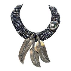 Vilaiwan designer costume jewelry statement necklace, chocker comprised of silver tone labradorite, black mother-of-pearl, marcasite, multi-colored faceted crystal and CZ (cubic zirconia), bead feather motif, signed on tag: "Vilaiwan Fine Jewelry." Approx: 13" inner circumference, extendable to 15". Bohemian Silver Necklace With Rhinestones, Handmade Silver Crystal Choker Necklace, Embellished Bohemian Jewelry, Silver Bohemian Crystal Necklace, Bohemian Silver Crystal Necklace, Luxury Handmade Crystal Necklace, Luxury Silver Beaded Necklaces For Jewelry Making, Silver Embellished Necklace For Gift, Unique Silver Embellished Jewelry