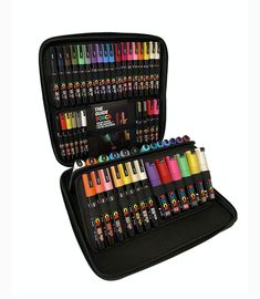 an open case filled with lots of different colored crayons