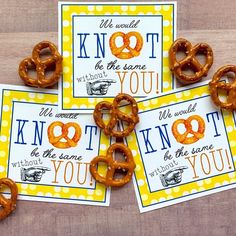 four cards with pretzels on them sitting next to each other