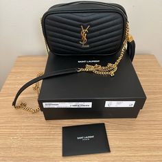 Lou Mini Bag Saint Laurent Bag / Color: Black + Gold Product Details Crossbody Strap, 22" Drop Dimensions: 7.75"W X 2"D X 4.75"H Zip Closure Exterior Slip Pocket, Interior Card Slots Ysl Saint Laurent, Saint Laurent Bags, Saint Laurent Bag, Crossbody Strap, Embossed Leather, Ysl Bag, Mini Bag, Card Slots, Leather Bag