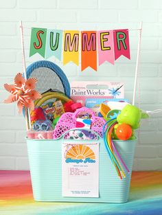 a bucket filled with lots of colorful items