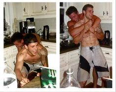 two men are in the kitchen and one is holding another man