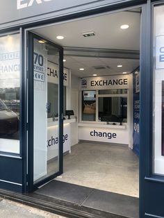 the entrance to an ex exchange store with large windows