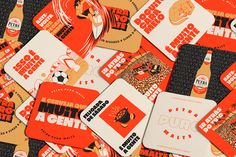 many different orange and white business cards