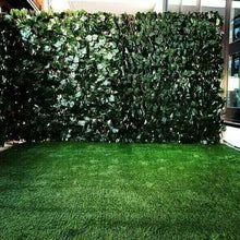 artificial grass covering the ground in front of a building