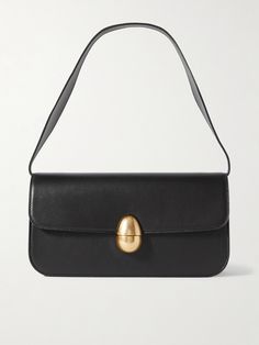 NEOUS' updates its signature 'Phoenix' bag in an elongated, retro-inspired 'Baguette'-style silhouette. Handmade in Italy from supple leather, it has a dual compartment interior with plenty of space for your phone, cardholder, lip-gloss and mints and closes with the signature egg-shaped hardware. Detach the curvy shoulder strap to carry it in-hand as a clutch. Manolo Blahnik Maysale, Classic Work Outfits, Style Wide Leg Jeans, Nashville Hot, Purse Essentials, Outfits To Wear, Classic Bags, Black Shoulder Bag, Boot Pumps