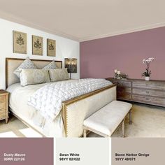 the bedroom is painted in shades of purple and white, with neutrals on the walls