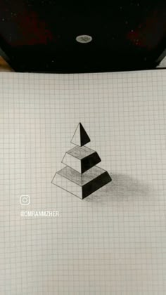 a pencil drawing of a pyramid on top of a piece of paper with the letter e in it