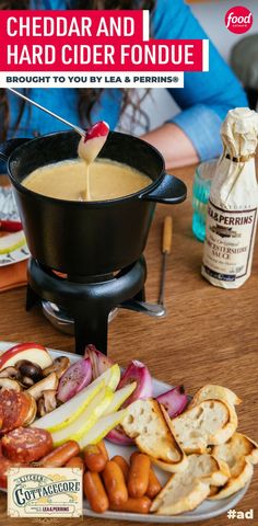 a plate with hot dogs, cheese and bread on it next to a bowl of soup