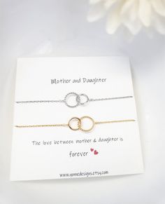 "❤ Mothers Day Gift. Mother Daughter Necklace. Interlocking Circle Necklace. Two Circle Linked Necklace. Meaningful Jewelry Gift for Mom. Sis ❤ ❤ NEVER TOO LATE to say Happy Mother's Day, send her Love ❤ This timeless necklace is crafted in modern designs and it features a minimal interlocked circle pendant and delicate 16k gold plated chain. The beautiful necklace makes it a piece of meaningful jewelry to be worn every day and a gift for your loved ones. Simply layer up or wear alone for effort Timeless Necklace, Interlocking Circle Necklace, Mother Daughter Necklace, Daughter Necklace, Meaningful Jewelry, Mom And Sister, Circle Necklace, Beautiful Necklace, Circle Pendant