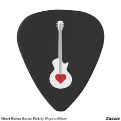 a guitar pick with a red heart on it