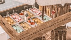 a wooden table topped with trays filled with food