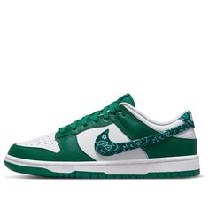 The Nike women’s Dunk Low Essential ‘Green Paisley’ is a stylish update to the classic hoops shoe. The signature Swoosh is covered in a green paisley-print textile, with a heel tab marked with embroidered Nike lettering. The upper is made of white leather, with contrasting green leather overlays at the forefoot and heel. The sneaker is mounted on a standard rubber cupsole, featuring white sidewalls and a green rubber outsole. (SNKR/Skate/Light/Low Top/Women's/Non-Slip) Wmns Dunk Low, Shoe Palace, Low Air Jordan 1, Nike Sb Dunks, Air Jordan 3, Nike Basketball, Jordan 3, Air Max 1, Nike Dunk Low