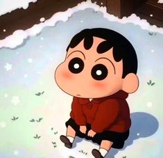 an animated image of a boy sitting on the ground in front of snow covered ground