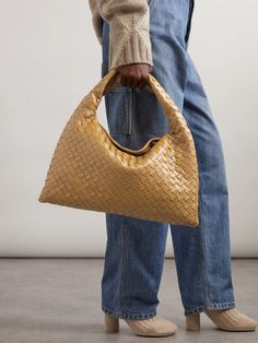 Find BOTTEGA VENETA Intrecciato Leather Tote on Editorialist. Bottega Veneta's small tote is crafted from supple leather and woven using the house's signature intrecciato technique. The top handle elegantly arches and the bag has a zipped pocket inside to secure smaller valuables. The main compartment can be used to stow a wallet, sunglasses and a water bottle. The tote is a streamlined shape and slightly slouches in the middle. Swimsuit Jewelry, Art Bags, Simplicity Fashion, Bottega Veneta Bags, Bottega Veneta Intrecciato, Fancy Bags, Raffia Bag, Jo Malone London, Small Tote