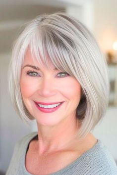 Bob with Soft Layers and Bangs Hairstyle on smiling older woman with gray silver hair. Layered Bob For Gray Hair, Shoulder Length Grey Hairstyles, Shoulder Length Gray Hair With Bangs, Grey Hair Bob Hairstyles, Grey Hair Styles For Women Over 50, Gray Hair Styles For Women Over 60 Grey, Gray Bob With Bangs, Medium Bob Hairstyles With Bangs, Aline Bob With Bangs