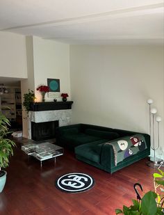 a living room filled with furniture and a fire place