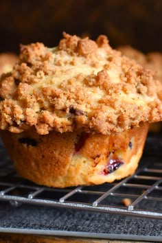 a muffin sitting on top of a cooling rack