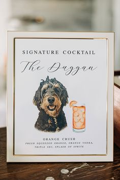 a sign with a dog on it that says, signature cocktail the dragon orange crush