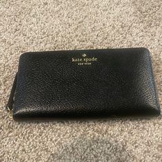 Brand New Kate Spade Black Leather Wallet With Gold Wrap Around Zipper. Large. Kate Spade Leather Wallets For Everyday Use, Kate Spade Black Wallet With Interior Card Slots, Kate Spade Evening Wallet With Card Slots, Black Leather Kate Spade Wallets, Kate Spade Black Wallet With Zipper Closure, Kate Spade Black Leather Wallet, Elegant Black Kate Spade Wallet, Kate Spade Black Wallet For Everyday Use, Black Kate Spade Wallet For Everyday Use