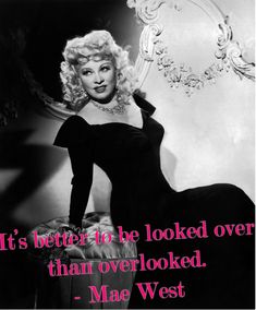 a woman in a black dress with a quote from mae west on her right side