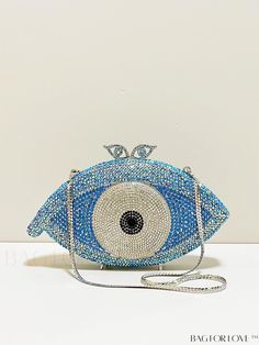 BagForLove - Silver and Blue Crystal Eye Pattern Clutch - Top-Quality Rhinestone Novelty Bag Product Description Color Baby Blue Details Rhinestone Magnetic Yes Strap Type Chain Pattern Type Figure Bag Size Mini Style Glamorous Closure Type Magnet Type Novelty Bag Material Zinc Alloy Composition 20% Polyurethane Care Instructions Do not wash Size Chart INCH CM Bag Height Bag Length Bag Width Strap Length 4.9 inch 7.5 inch 2 inch 19.7 inch Bag Height Bag Length Bag Width Strap Length 12.5 cm 19 cm 5 cm 50 cm Details Pictures Similar Products h2 { text-align: center; } /* æ¢è¡ */ li{ white-space: normal; word-break: break-all; word-wrap: break-word; } .red-box { width: 100%; display: flex; flex-direction: row; flex-wrap: wrap; justify-content: center; } .red-box > div { width: 190px; heigh Blue Rhinestone Evening Bag, Blue Rhinestone Clutch Bag, Blue Evening Bag With Rhinestones, Blue Rhinestone Clutch For Events, Blue Rhinestone Clutch Evening Bag, Blue Pouch Bag For Events, Eye Pattern, Chain Pattern, Crystal Eye