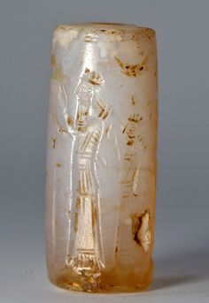 an ancient egyptian carved glass vase