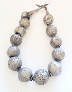 "Beautiful Large and heavy coin silver beads made by the Harrar people of Ethiopia. Very impressive indeed! The beads are handmade of a good silver alloy (though below sterling of course). The beads are hollow and filled with clay, resin or a similar substance to stabilize them. The necklace is traditionally strung on thread which is simply knotted at the back, allowing to be worn a bit longer or shorter. Of course the necklace could also be restrung. Collectors, however, may prefer it in its or Ethiopian Jewelry, Jewelry Royal, African Necklace, Silver Bead Necklace, Antique Wedding, Silver Chain Style, Royal Jewels, African Jewelry, Necklace Box