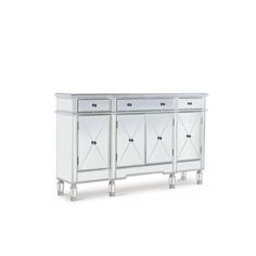 a white and silver cabinet with three doors on one side, and two drawers on the other