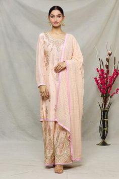 Shop for Abhi Singh Peach Georgette Floral Embroidered Kurta Sharara Set for Women Online at Aza Fashions Embroidered Sharara For Reception With Straight Kurta, Embroidered Sharara With Straight Kurta For Reception, Reception Palazzo Set With Floral Embroidery, Resham Embroidery Sharara For Reception, Reception Sets With Chikankari Embroidery In Straight Kurta, Chikankari Embroidered Dola Silk Sharara For Reception, Festive Dola Silk Palazzo Set With Floral Embroidery, Festive Dola Silk Sharara With Floral Embroidery, Reception Sets With Chikankari Embroidery