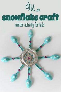 a snowflake made out of plastic spoons and beads with the words diy snowflake winter craft for kids