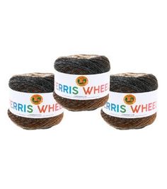 three balls of yarn with the words ferriss wheel on them