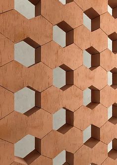 an abstractly designed wall with cubes on it's sides and one in the middle