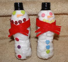 two snowmen made out of plastic bottles