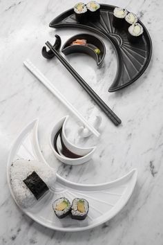 sushi and chopsticks on a marble table