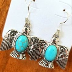 Silver Tone Southwestern Thunderbird Earrings With Turquoise Centerpiece. $12 For 1 Pair Bundle Items Listed As 3 For $15 For Sale Price. No Limit. See My Closet For Other Listings Pacsun, Dutch Bros, Pink, Zumiez, Adidas, Roxy, Hollister, Columbia, Nike, H & M, Rue 21, Brandy Melville, Aerie Wetseal Forever 21 Levi's Adidas Express Old Navy Victoria's Secret J Crew Van's Lululemon Gymshark Southwestern Silver Jewelry For Summer, Silver Southwestern Jewelry For Summer, Bohemian Silver Jewelry With Bird Design, Silver Bohemian Jewelry With Bird Design, Turquoise Centerpieces, Oversized Hoop Earrings, Rabbit Earrings, Crystal Heart Earrings, Dutch Bros