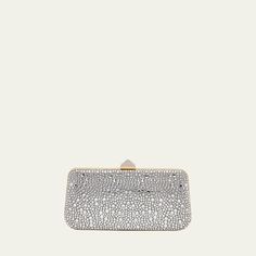 Valentino Garavani "Carry Secrets" clutch bag in allover rhinestones  Detachable chain shoulder strap Can be worn as a clutch or shoulder bag  Structured top with Roman Stud lift-clasp closure  Approx. 3.9"H x 8.3"W x 1.6"D Made in Italy Structured Top, Rhinestone Clutch, 6 D, Valentino Garavani, Carry On, The Secret, Clutch Bag, Shoulder Strap, Tops Designs