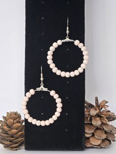 Thank you for viewing!  This natural wood bead set was handcrafted in the Upper Peninsula of Michigan on January 26th, 2024.  The hoops are approximately 2 inches in circumference, and are beaded natural wooden beads. Wood Bead Earrings, Upper Peninsula, Bead Set, Beaded Hoop Earrings, Bead Earrings, Jewelry Earrings Hoops, Natural Beads, Wooden Beads, Wood Beads