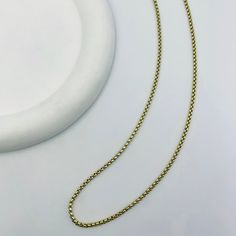 This trendy chain necklace is the perfect way to add a touch of personality to your look. The unique box chain design is both stylish and modern, and the versatile length makes it easy to wear with any outfit. Layer it with other necklaces for a more personalized look, or wear it alone for a minimalist statement.Available in gold and silver. Everyday Metal Necklaces With Rolo Chain, Trendy Delicate Snake Chain Necklace Gift, Trendy Gold Box Chain Necklace, Minimalist Long Cable Chain Necklace, Gift Snake Chain Necklace With Delicate Chain, Minimalist Snake Chain Necklace For Gift, Modern Box Chain Necklace Gift, Minimalist Necklace With Rectangular Box Chain Links, Minimalist Box Chain Necklace With Rectangular Links