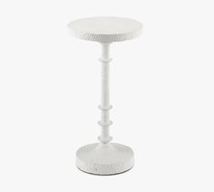 a white table that is on top of a stand