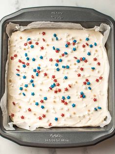 Sourdough sugar cookie bars with vanilla frosting are a breeze to make and consistently steal the show at any party! Customize the sprinkles for the perfect dessert to celebrate the holidays or any special occasion.